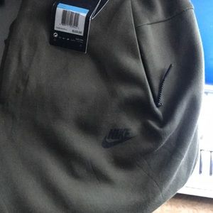 Brand new Nike joggers olive green
